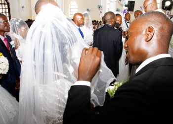 Pictorial: All Saints Cathedral weds 16 in corporate wedding