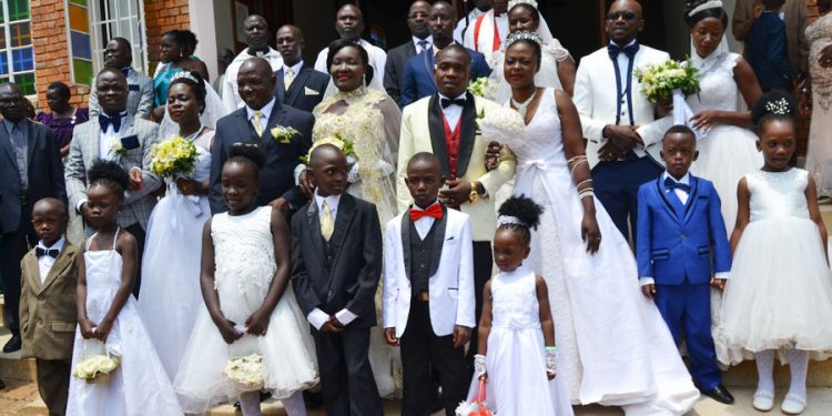 Same day, same place: Five workmates make joint wedding