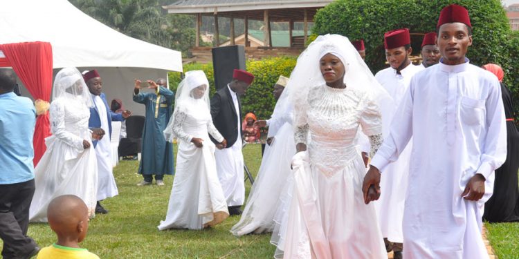 20 youth couples wed in a Muslim mass wedding