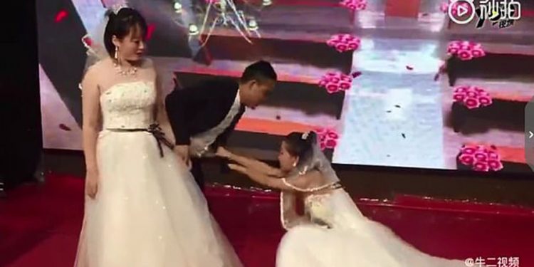 Ex-girlfriend crashes a couple’s wedding wearing a bridal gown