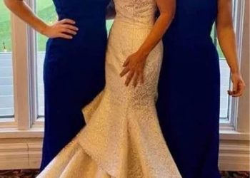 Mother-in-law blasted for wearing long white fishtail dress to her son’s wedding ceremony