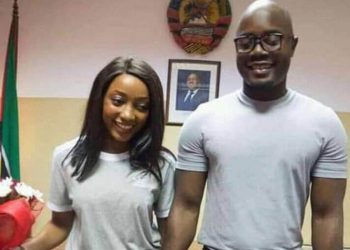 Couple weds dressed in training suits and sneakers