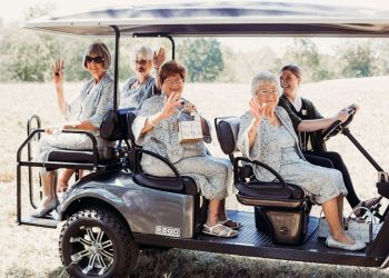 A couple makes their four grandmothers flower girls