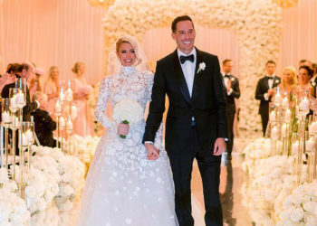 American model Paris Hilton walks down the aisle