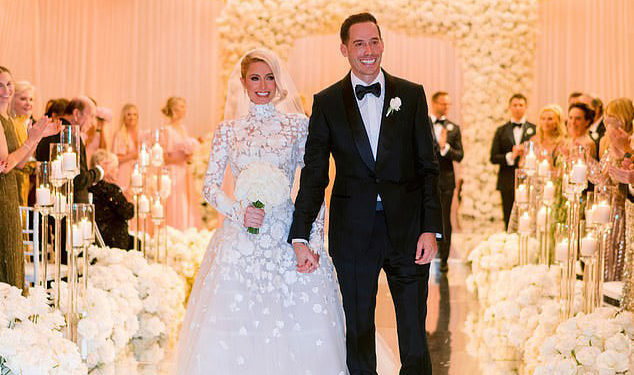 American model Paris Hilton walks down the aisle