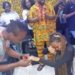 Nigerian woman kneels to accept proposal from boyfriend