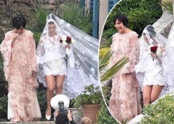 Kourtney Kardashian gets married in mini bridal dress