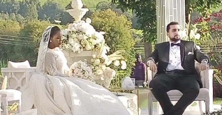 Helicopter drops rose petals as South Sudanese business mogul’s daughter weds